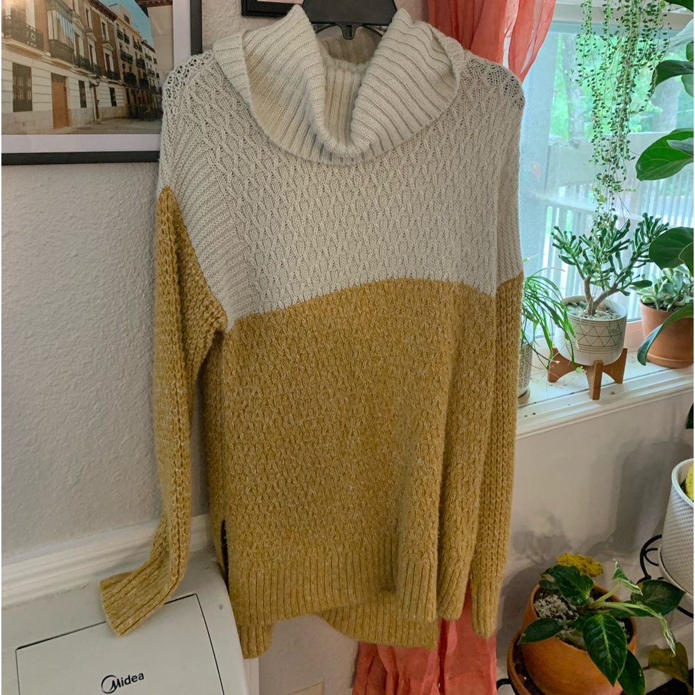 white and yellow oversized turtleneck sweater